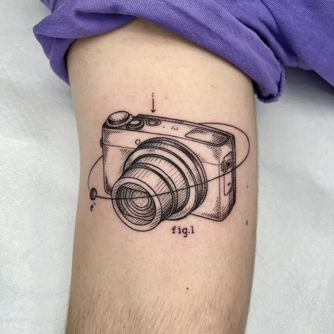 Intricate camera tattoo with artistic details