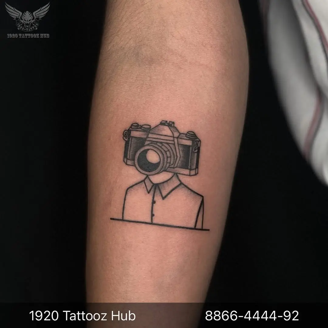 Stylish camera tattoo with a unique twist