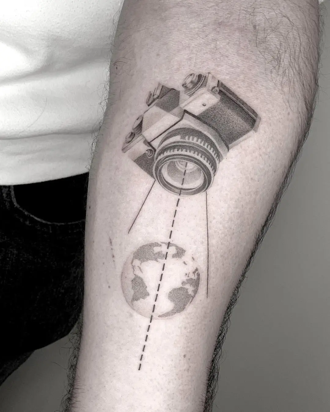 Detailed camera tattoo with globe illustration
