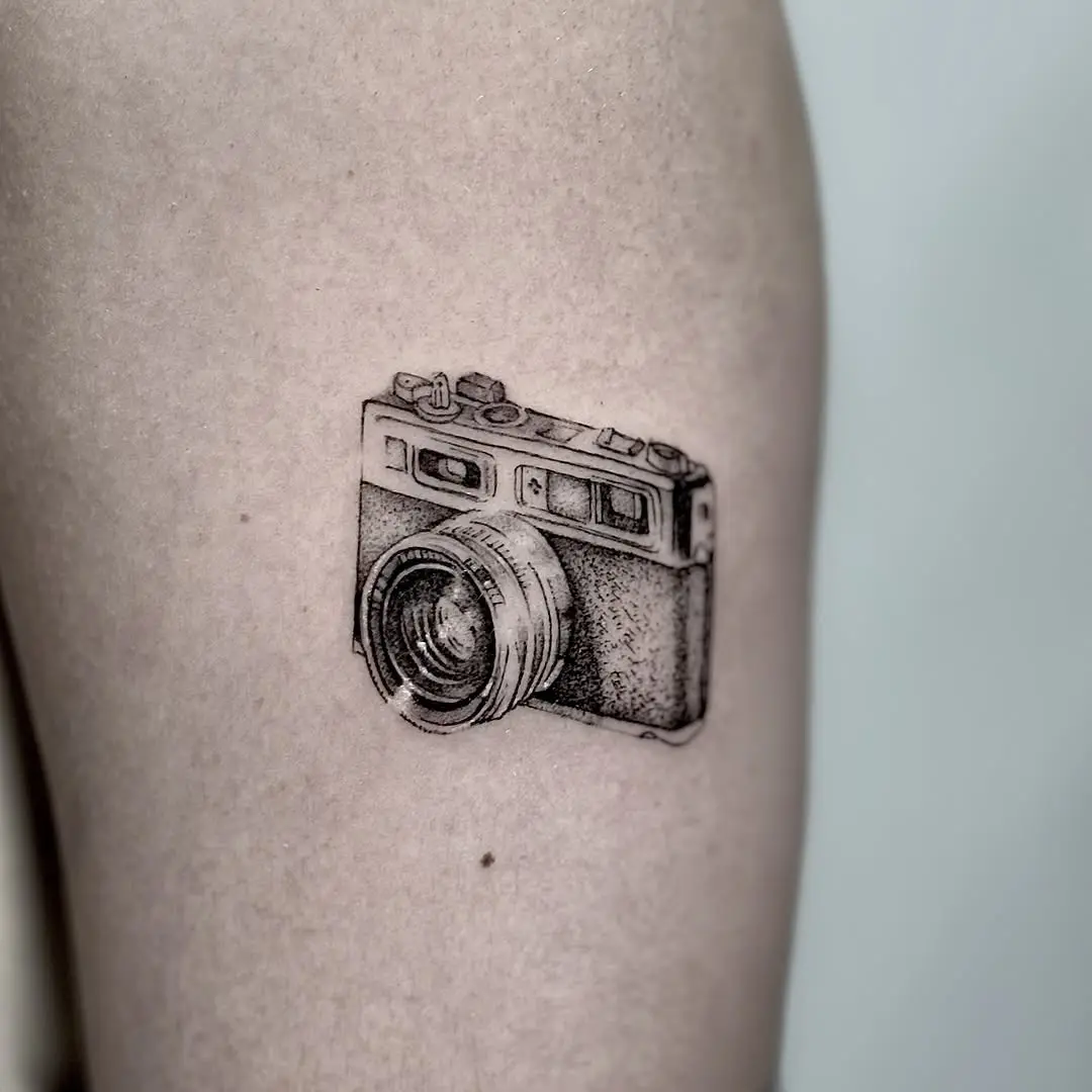 Stylish vintage camera tattoo for photography lovers