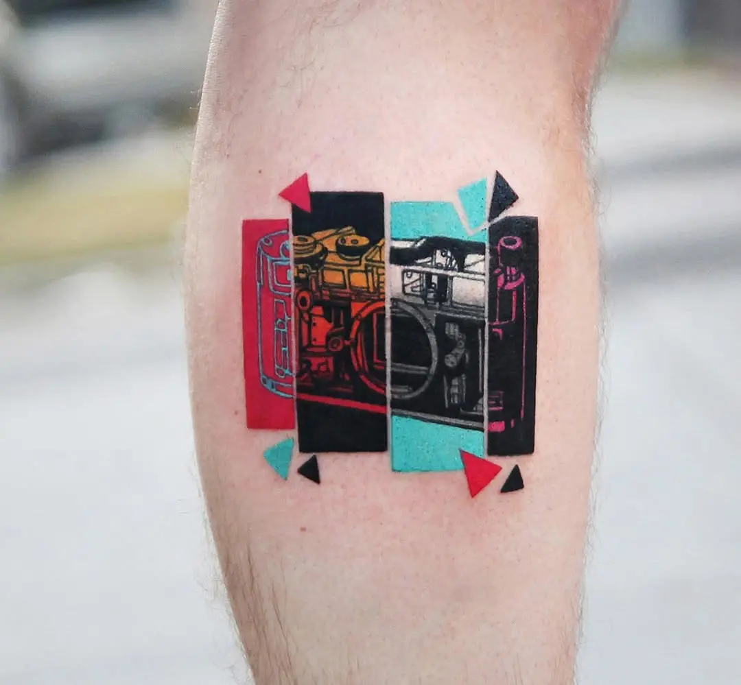 Stylish camera tattoo with vibrant colors