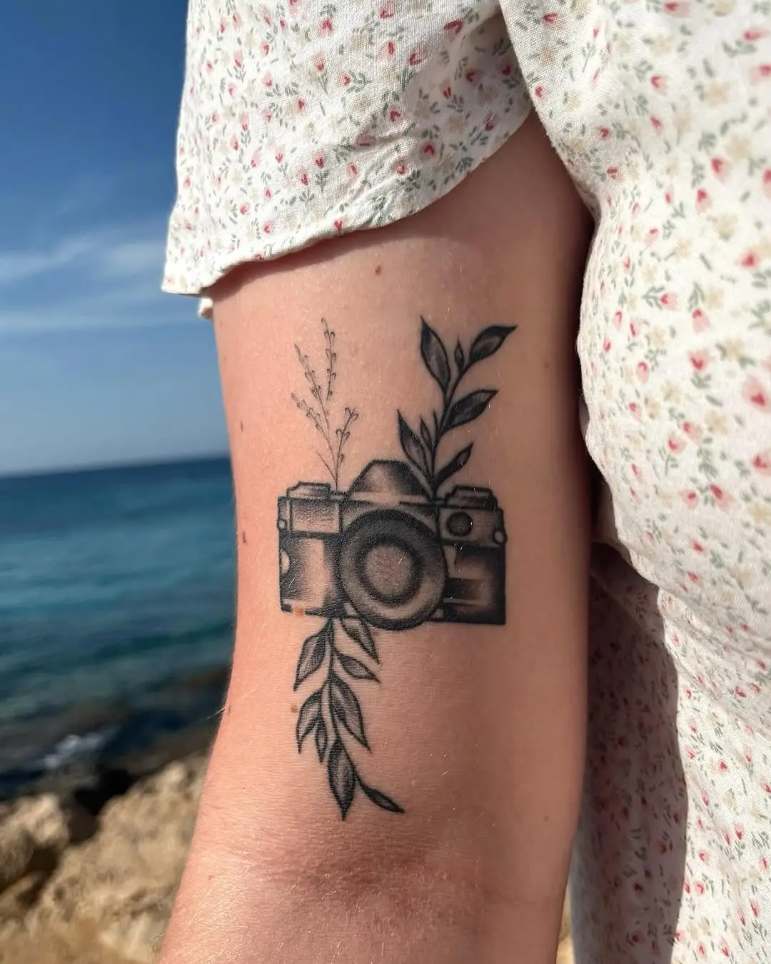 Aesthetic Camera Tattoo with Floral Elements
