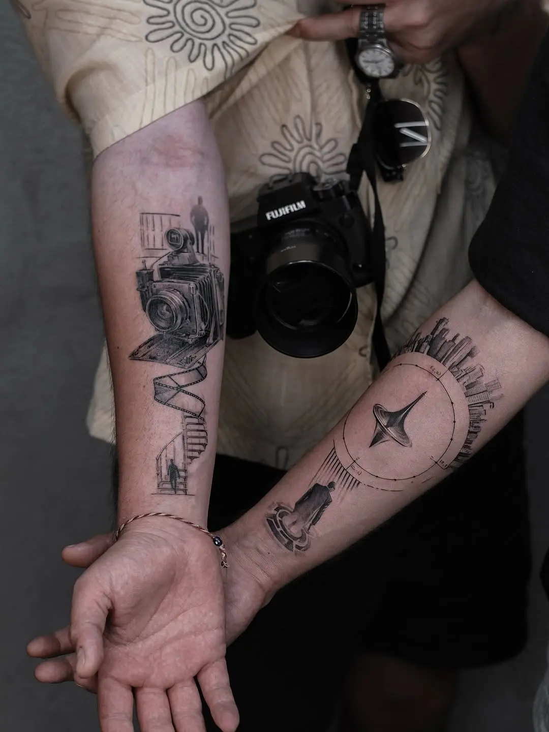 Artistic camera tattoos capturing moments and memories