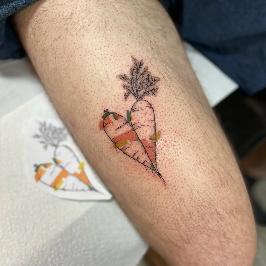 Charming heart-shaped carrot tattoo with vibrant colors