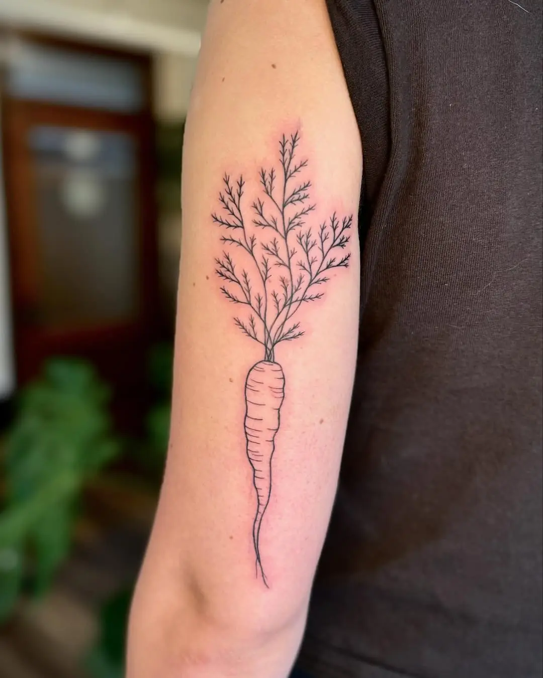 Unique minimalist carrot tattoo with delicate details