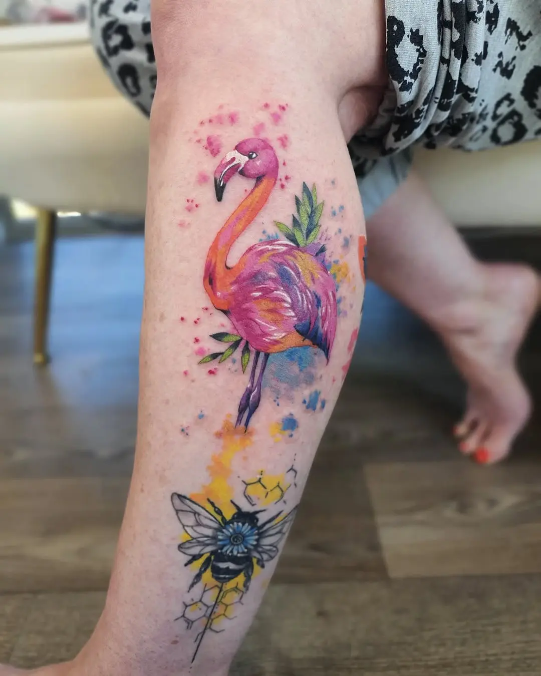 Vibrant Flamingo Tattoo with Floral Accents