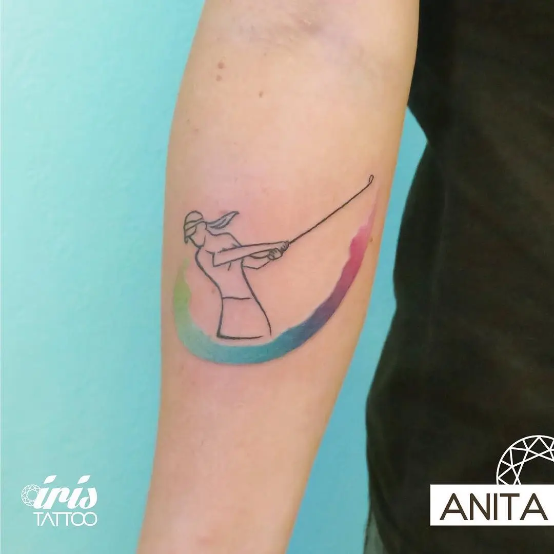 Colorful golfer tattoo showcasing dynamic movement