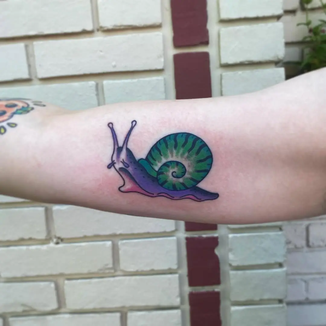 A Vibrant Snail Tattoo on Display