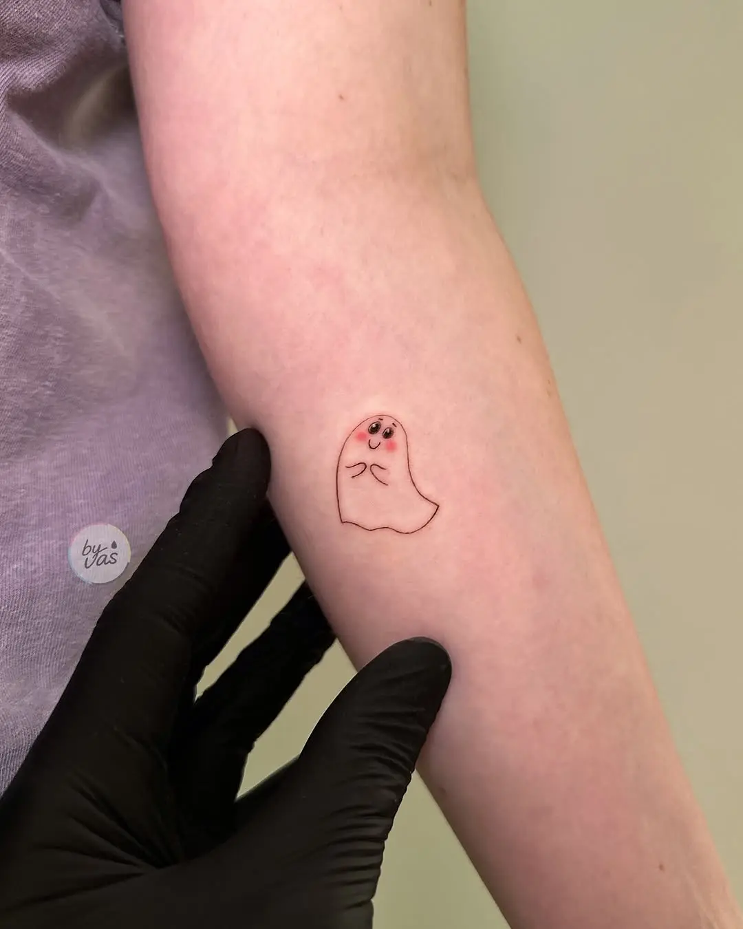 Adorable minimalist ghost tattoo for fun vibes