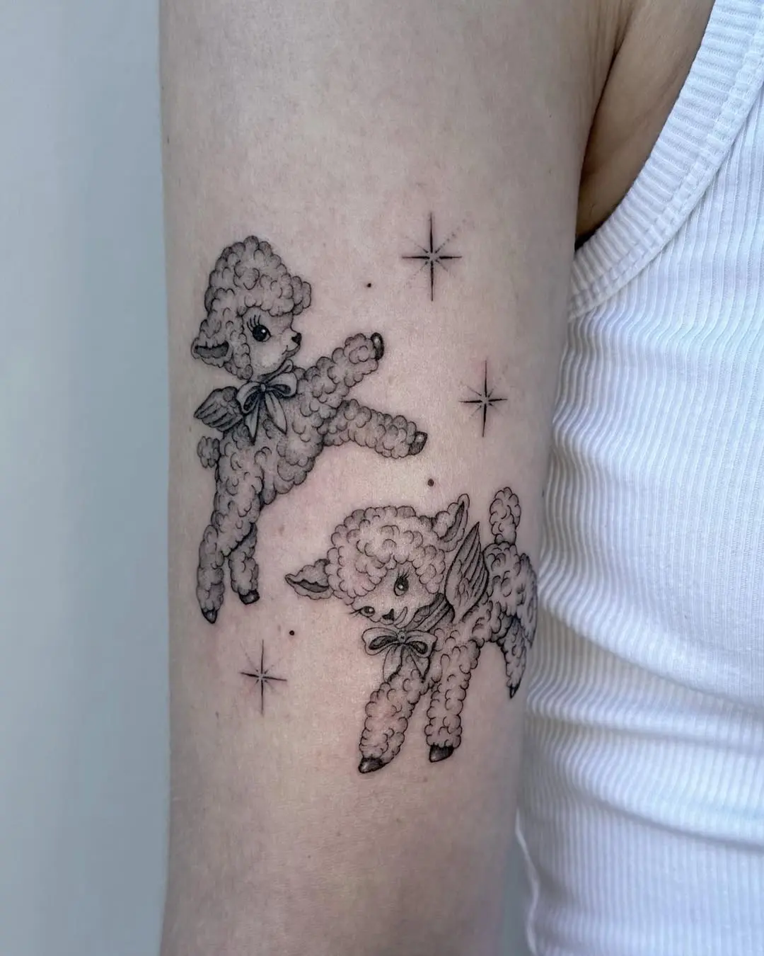 Adorable lamb tattoos with a whimsical touch