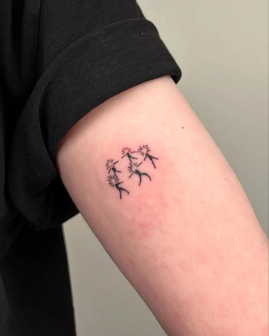 Elegant dancers captured in delicate ink design
