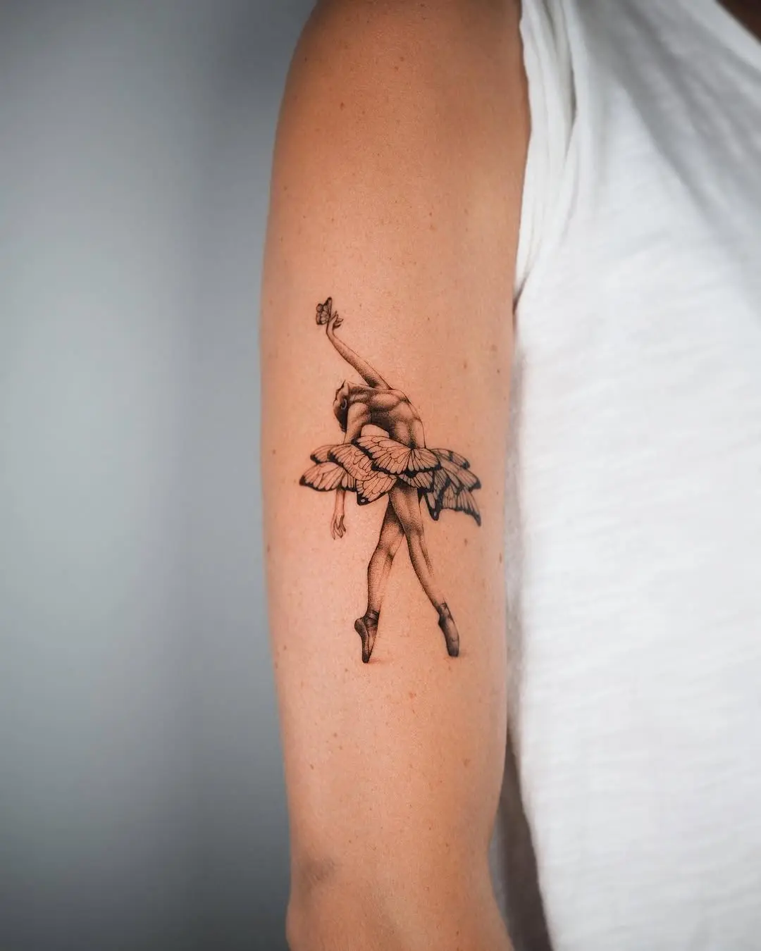 Elegant ballet swan tattoo celebrating dance artistry