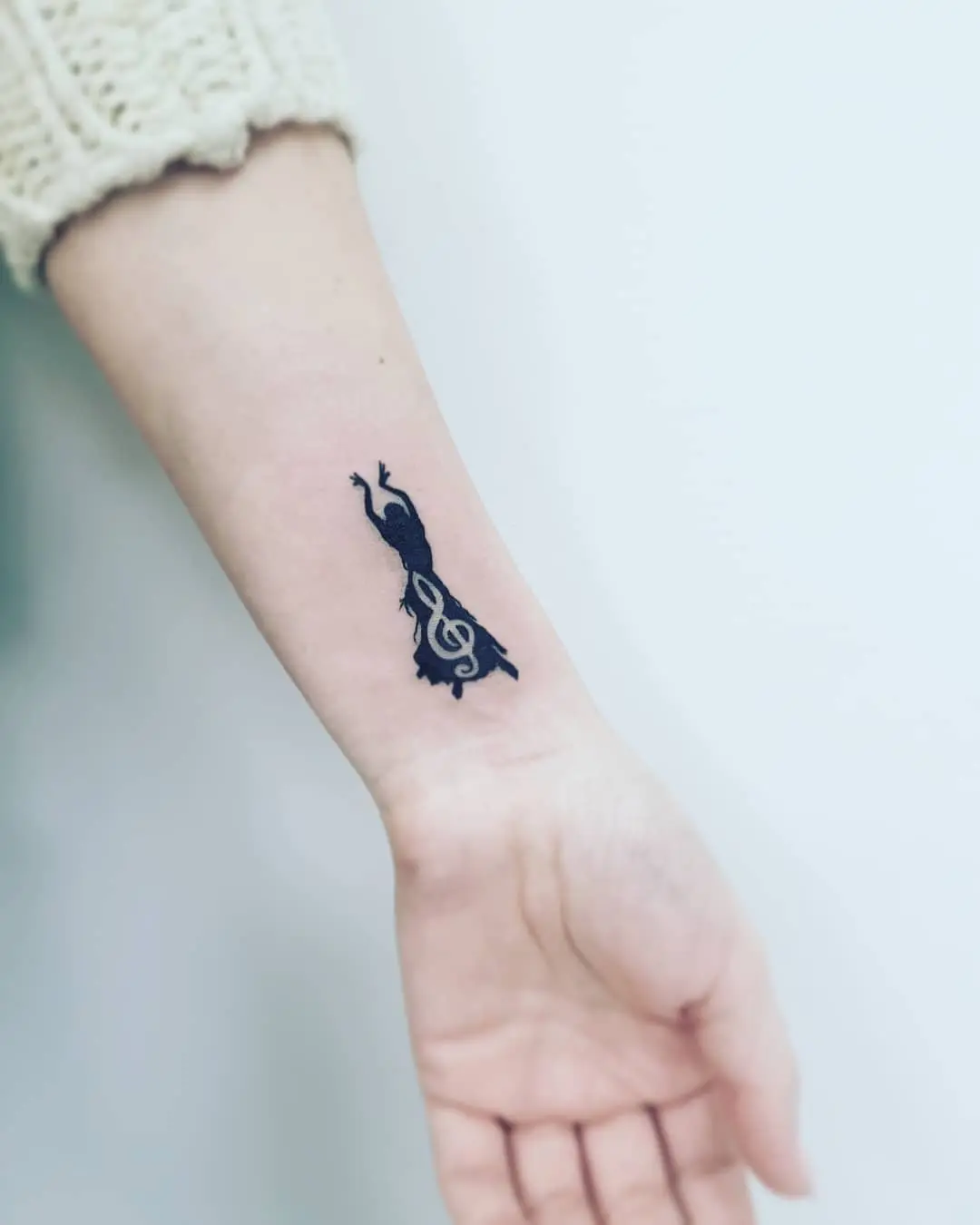 Graceful dancer intertwined with musical notes