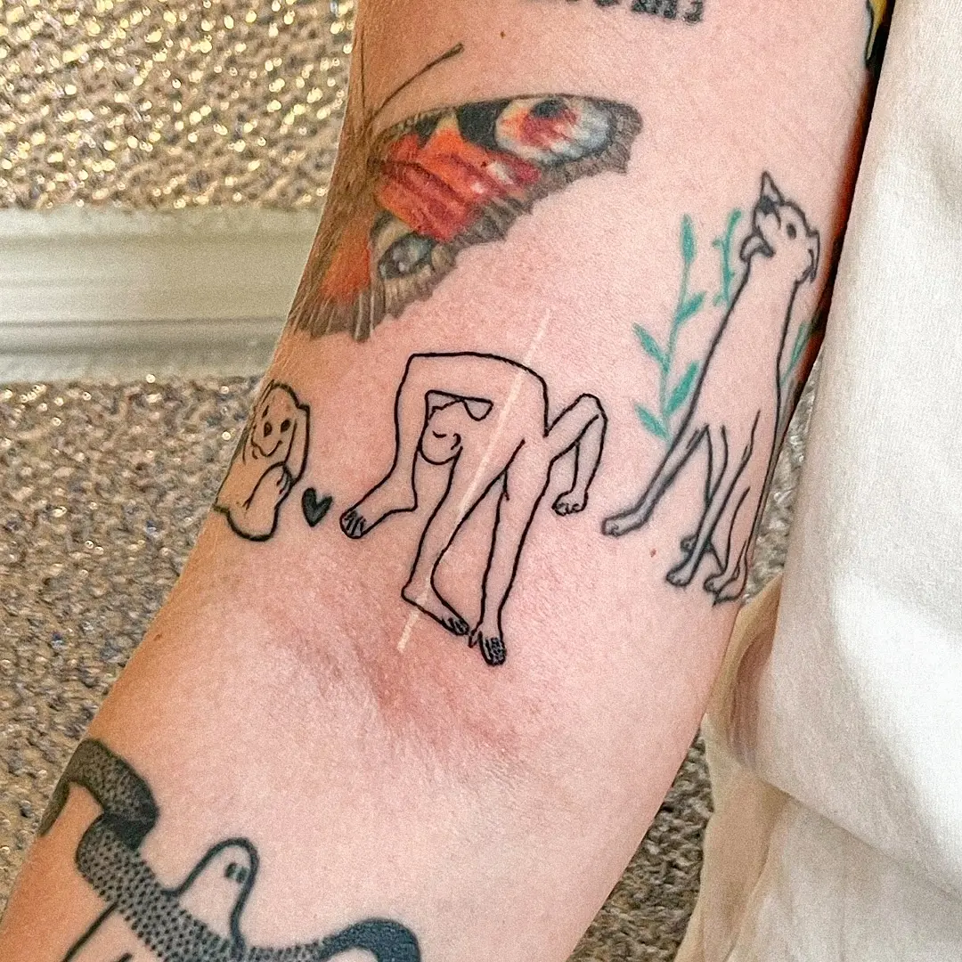 Playful animal-inspired minimalist dance tattoos