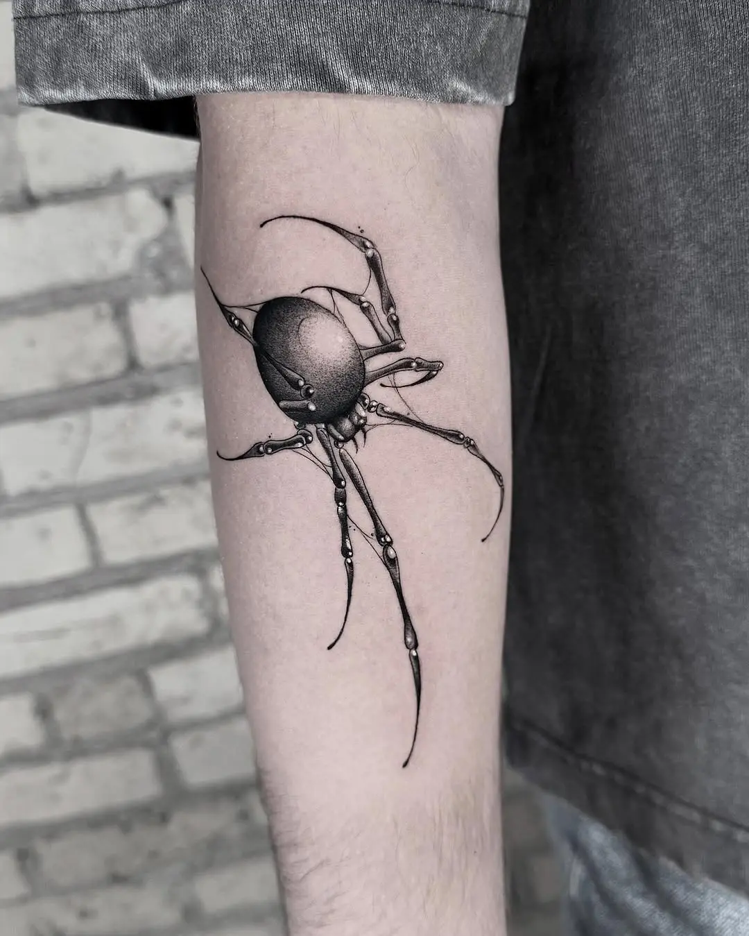Intricate spider tattoo showcasing realistic design