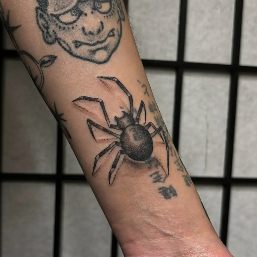 Stylish black and gray spider tattoo design