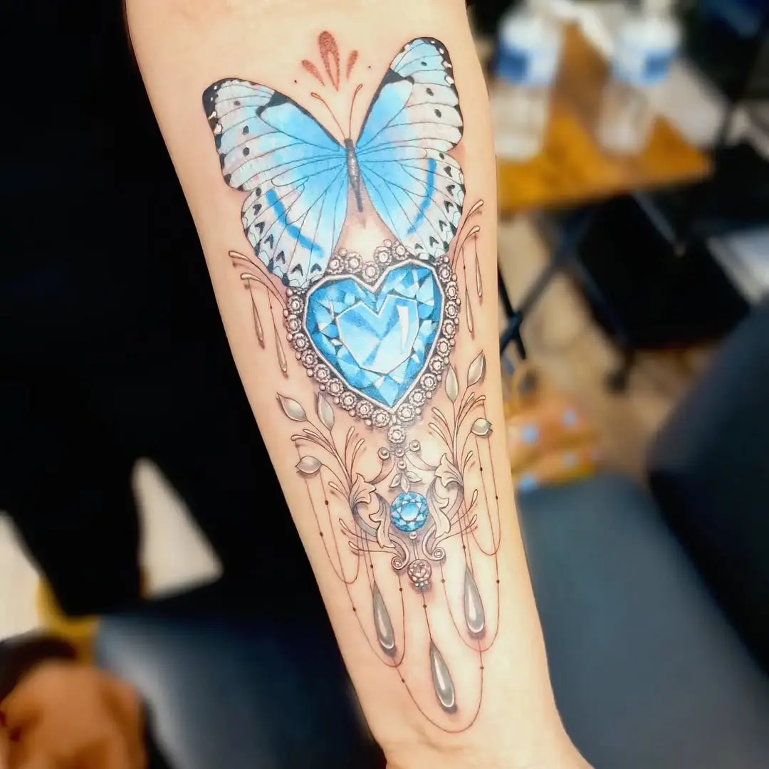 Stunning butterfly tattoo with diamond heart design