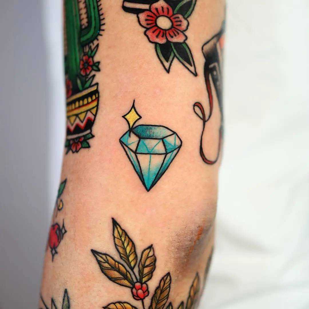 Colorful diamond tattoo with playful vibes