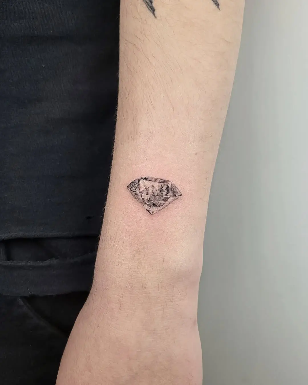 Minimalist Diamond Tattoo on Forearm