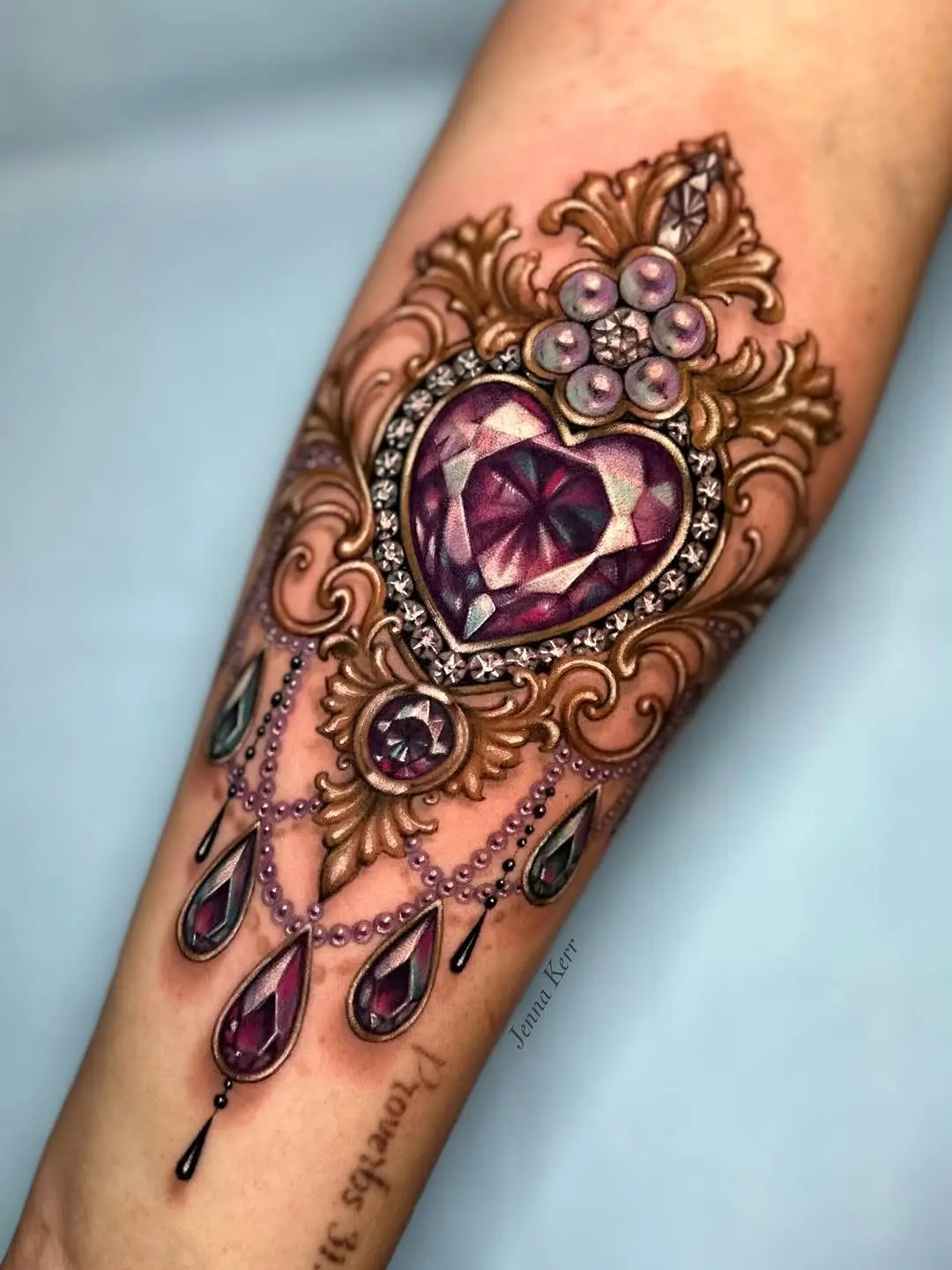 Elegant diamond tattoo showcases regal charm.