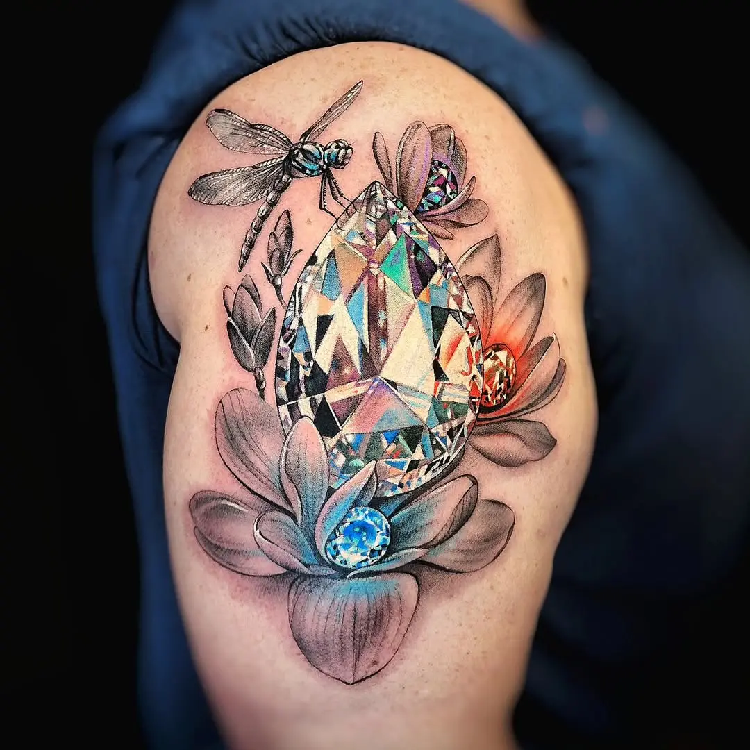 Elegant diamond tattoo surrounded by floral elements