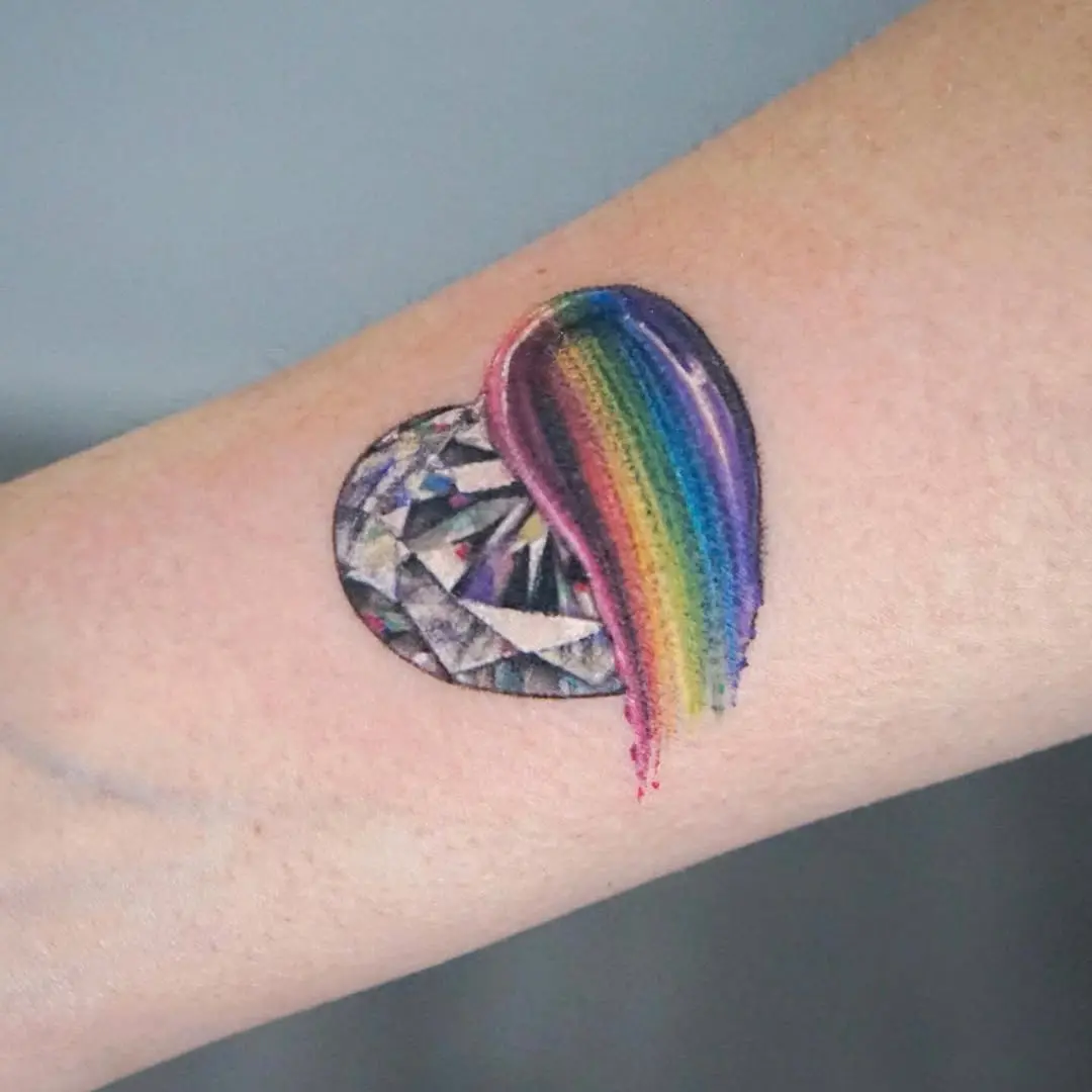 Vivid heart-shaped diamond tattoo with rainbow flair