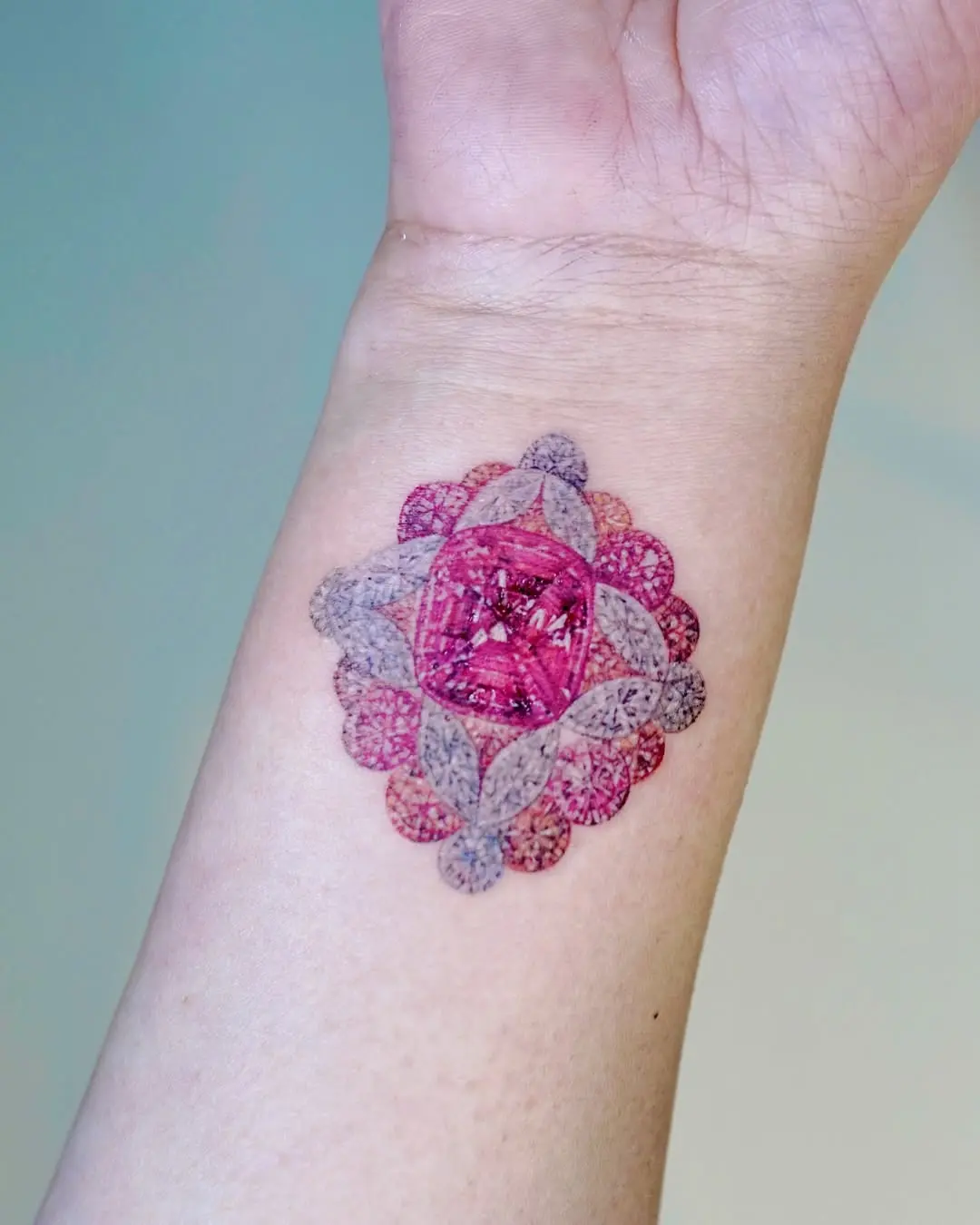 Stunning diamond-themed wrist tattoo design