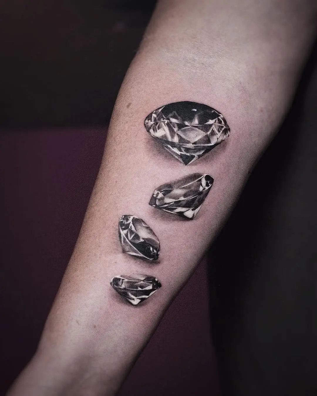 Realistic diamond tattoo design on the forearm