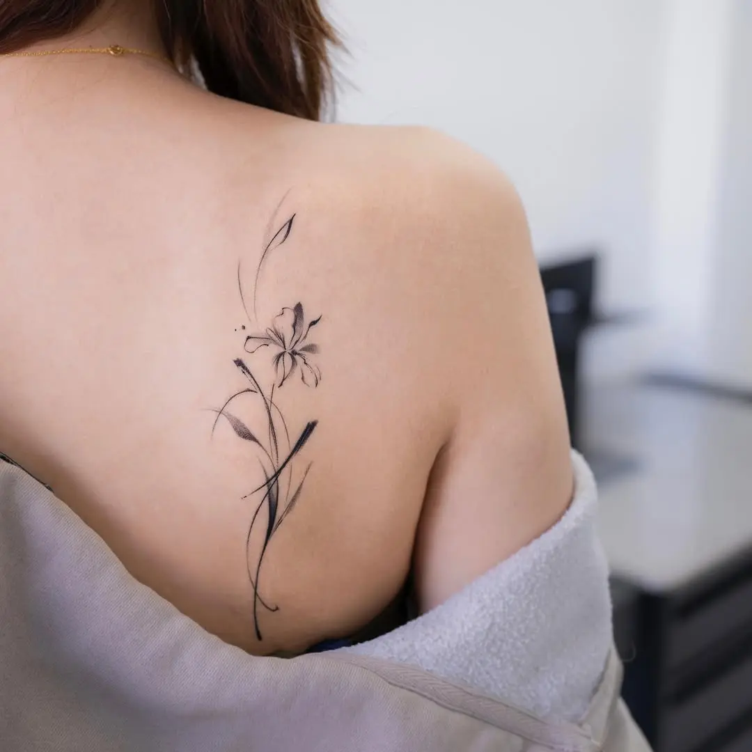 Elegant iris tattoo on the back