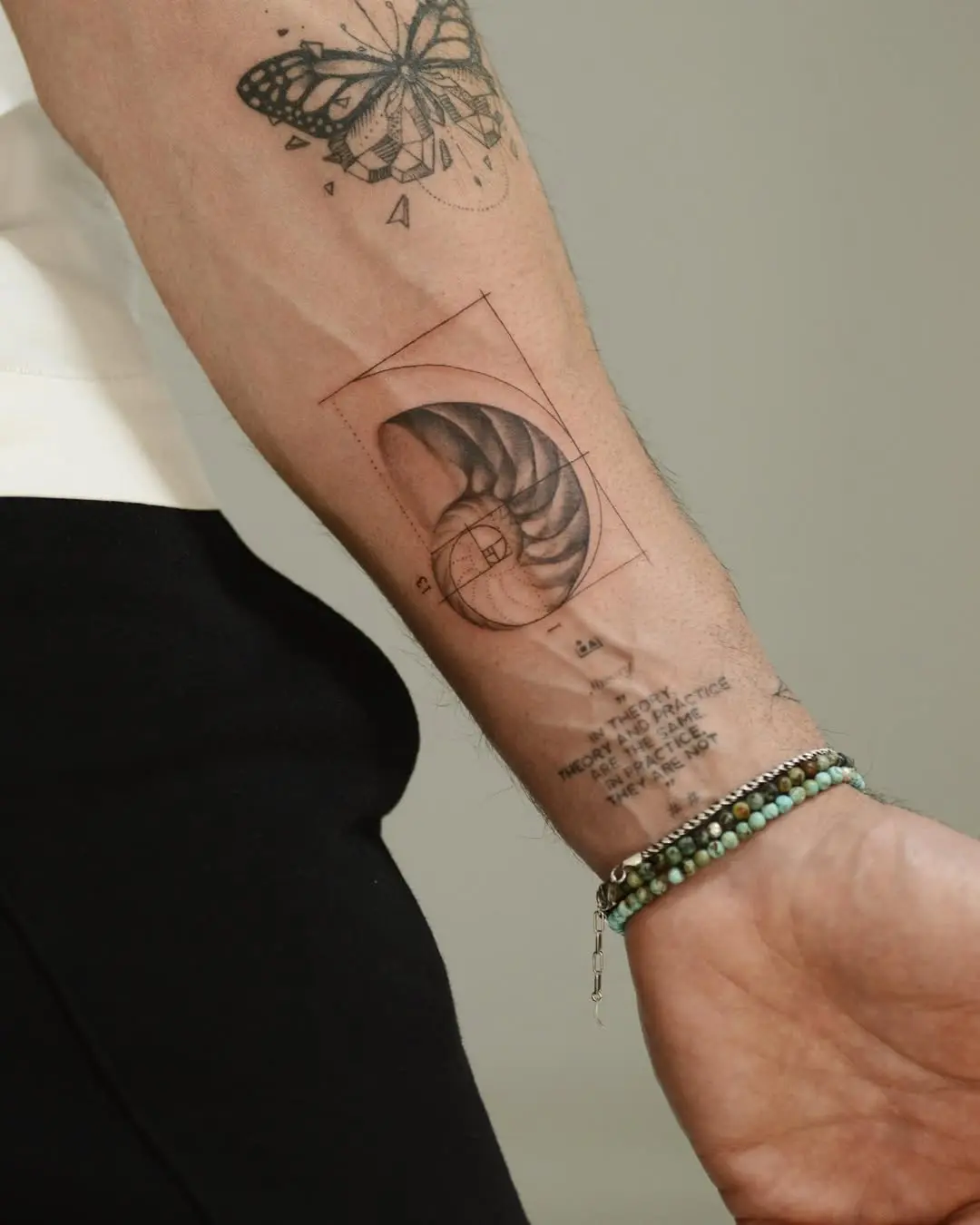 Fibonacci-inspired tattoo on a forearm.