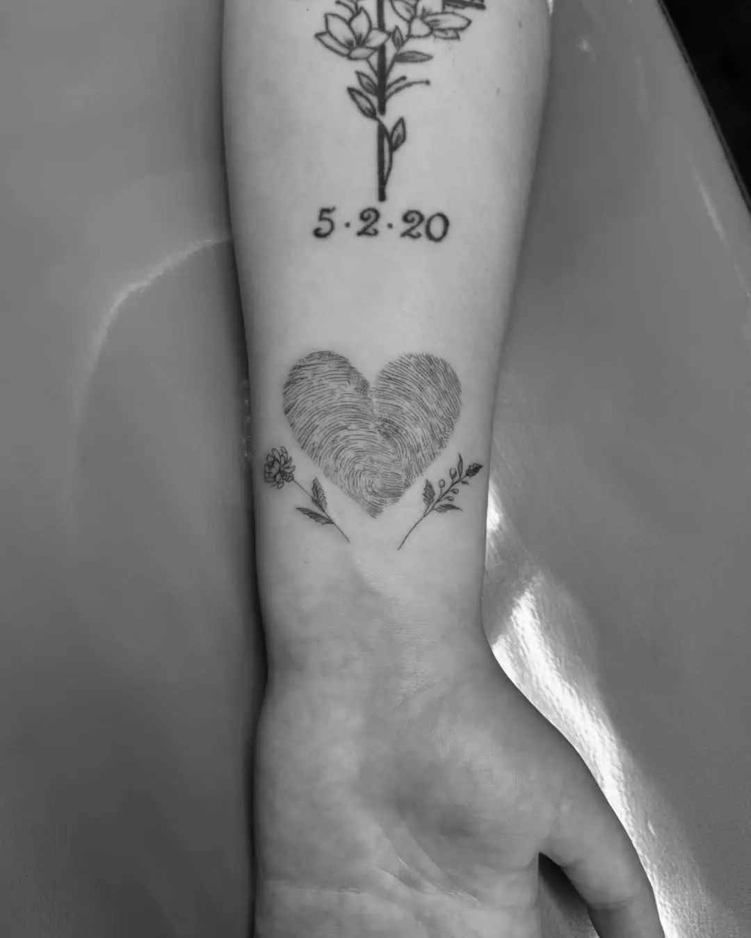 Unique Heart-Shaped Fingerprint Tattoo Design