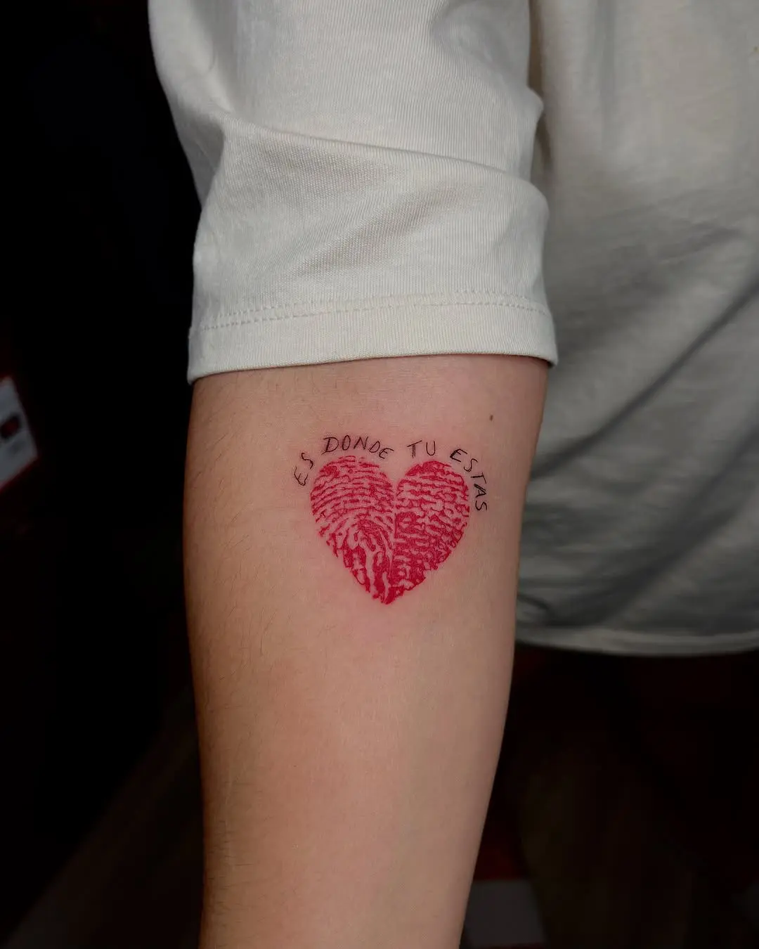 Unique heart-shaped fingerprint tattoo design