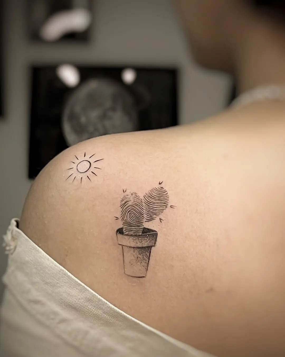 Unique fingerprint tattoo with heart-shaped design