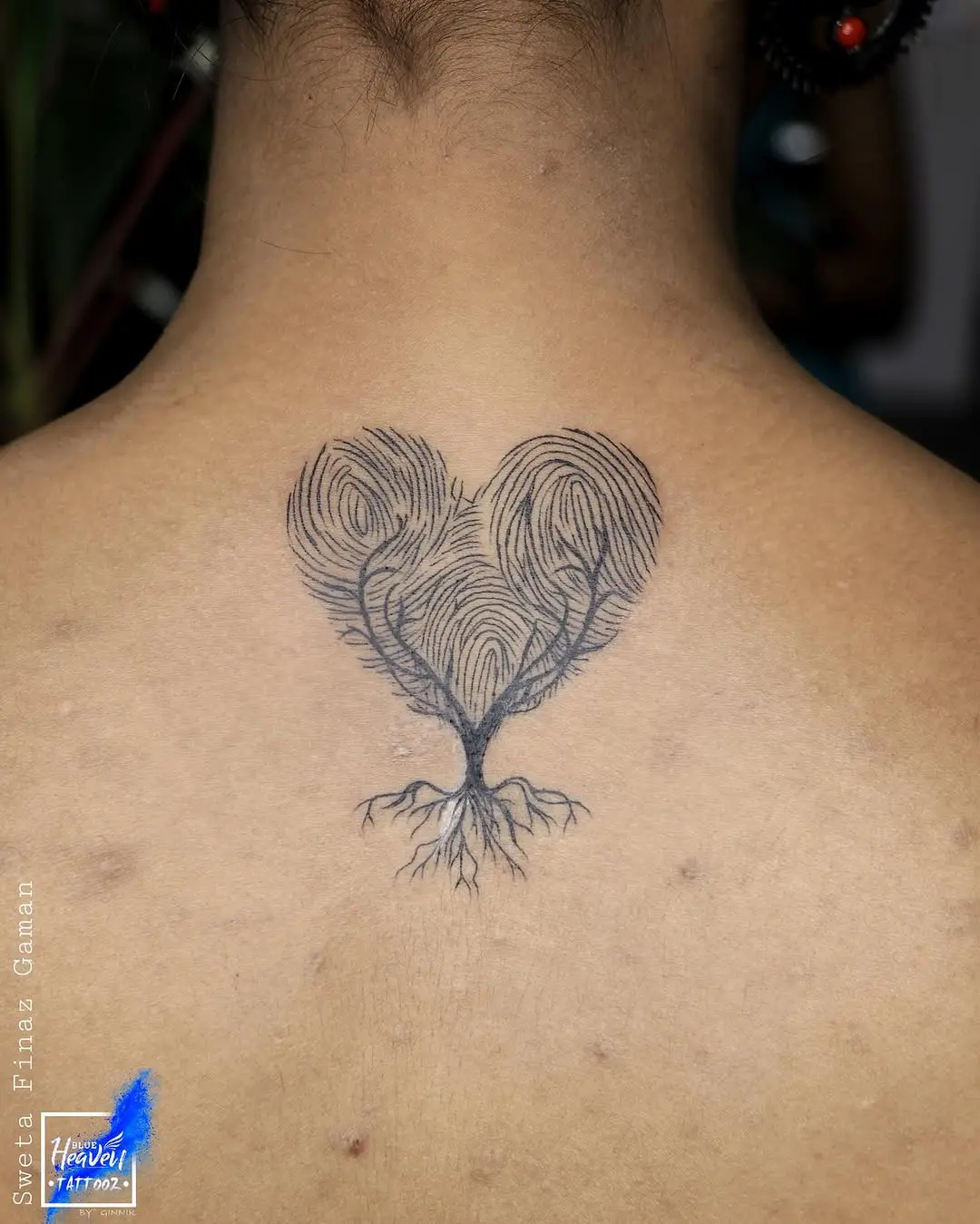 Unique Heart-Shaped Fingerprint Tattoo Design