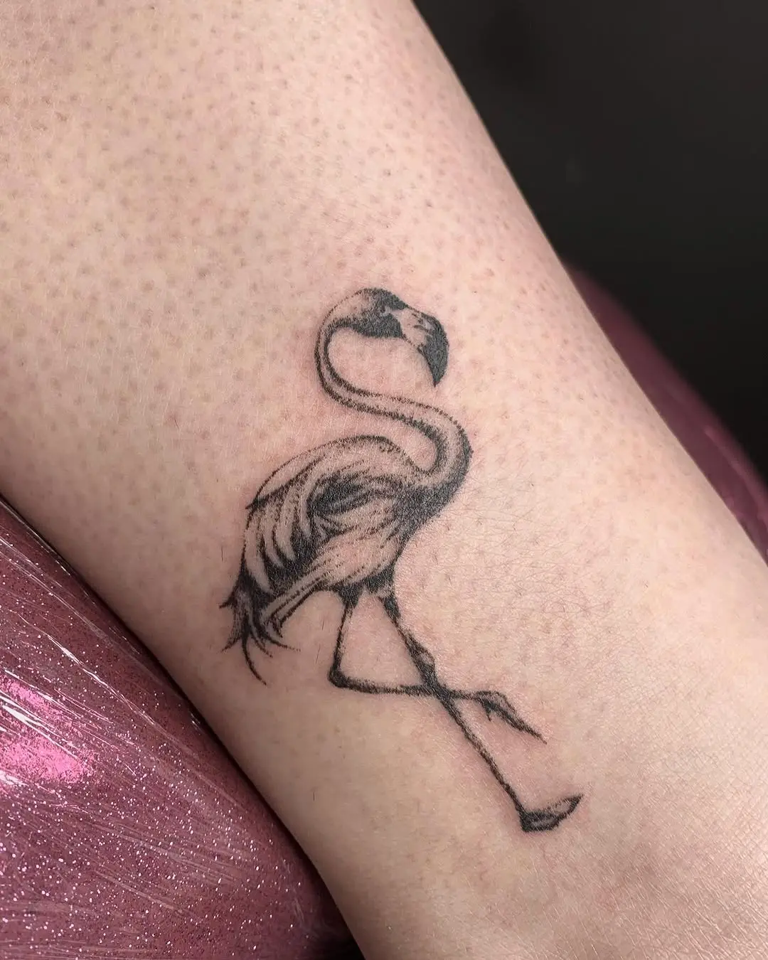 Chic minimalist flamingo tattoo design for ink lovers