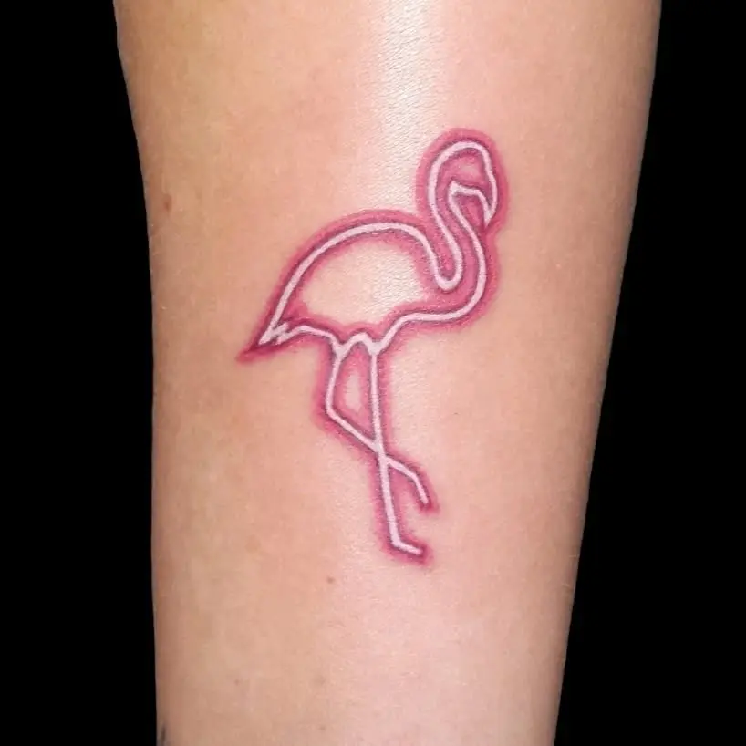 Minimalist flamingo tattoo design in pink hue
