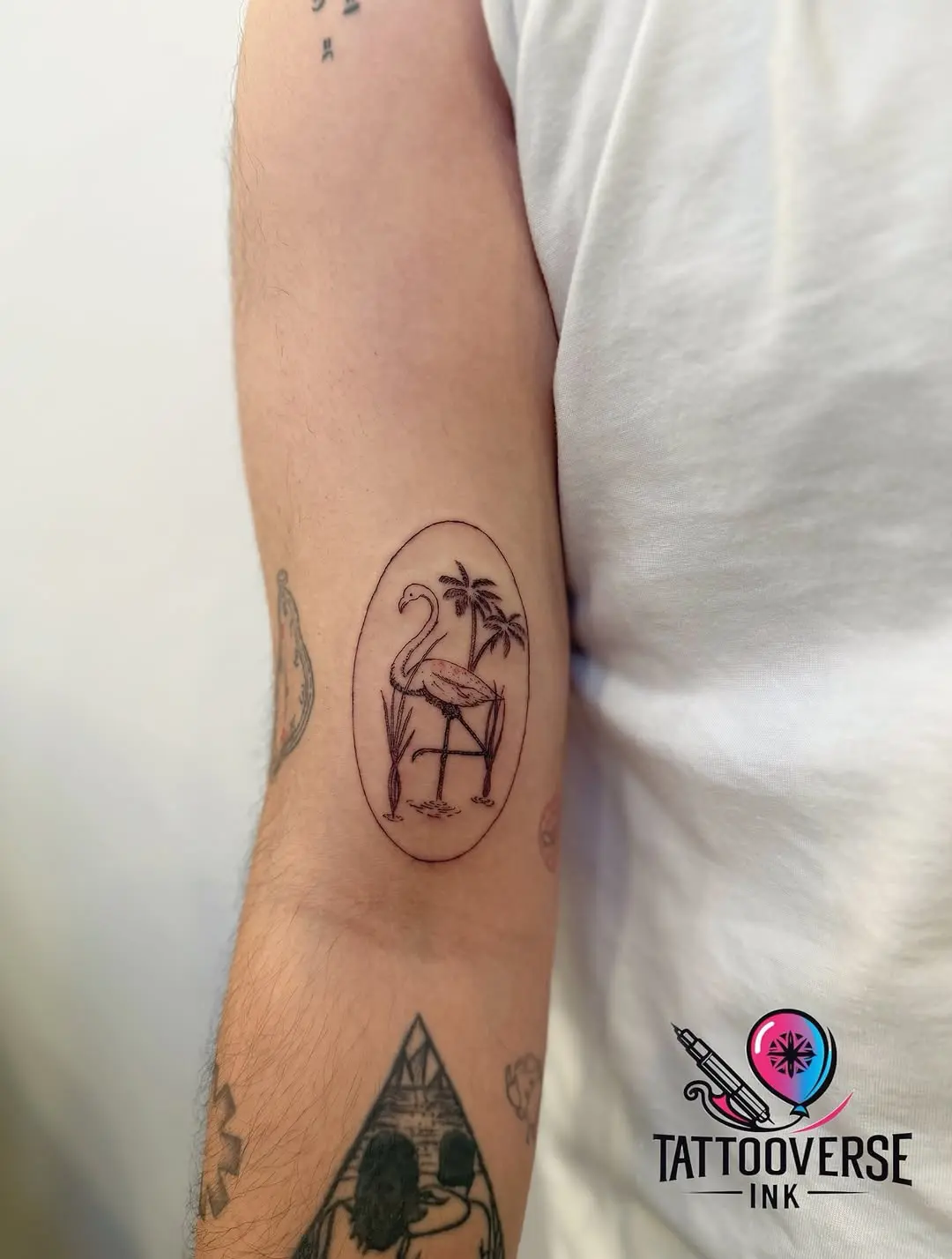 Stylish flamingo tattoo with tropical vibes