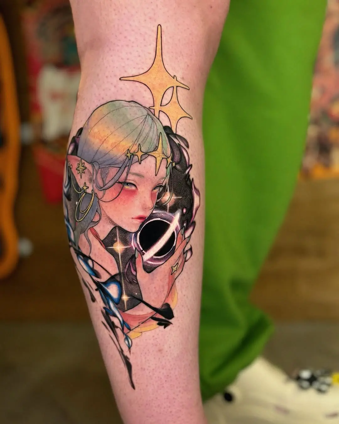 Captivating galaxy tattoo featuring a mystical girl