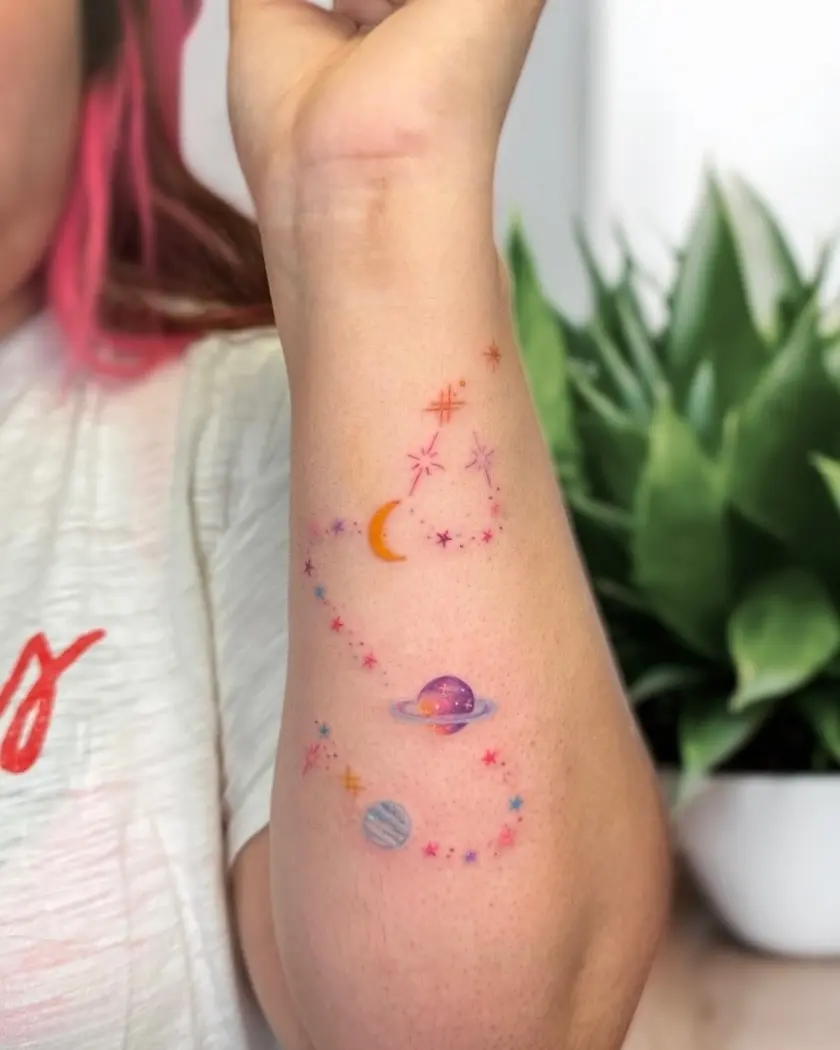 Vibrant Galaxy Tattoo Design on Arm