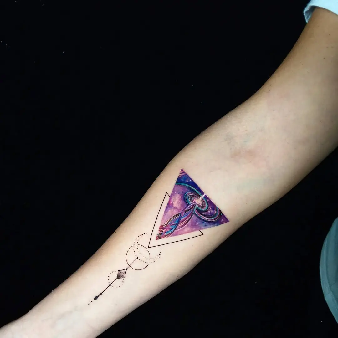 Vibrant Galaxy Triangle Tattoo on Forearm