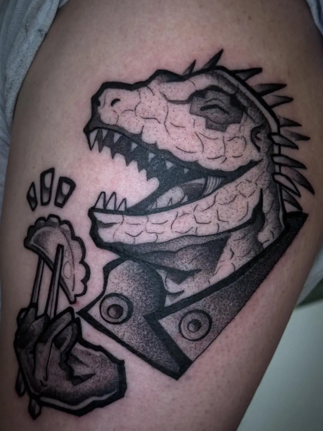 Bold Dinosaur Tattoo with Playful Vibes