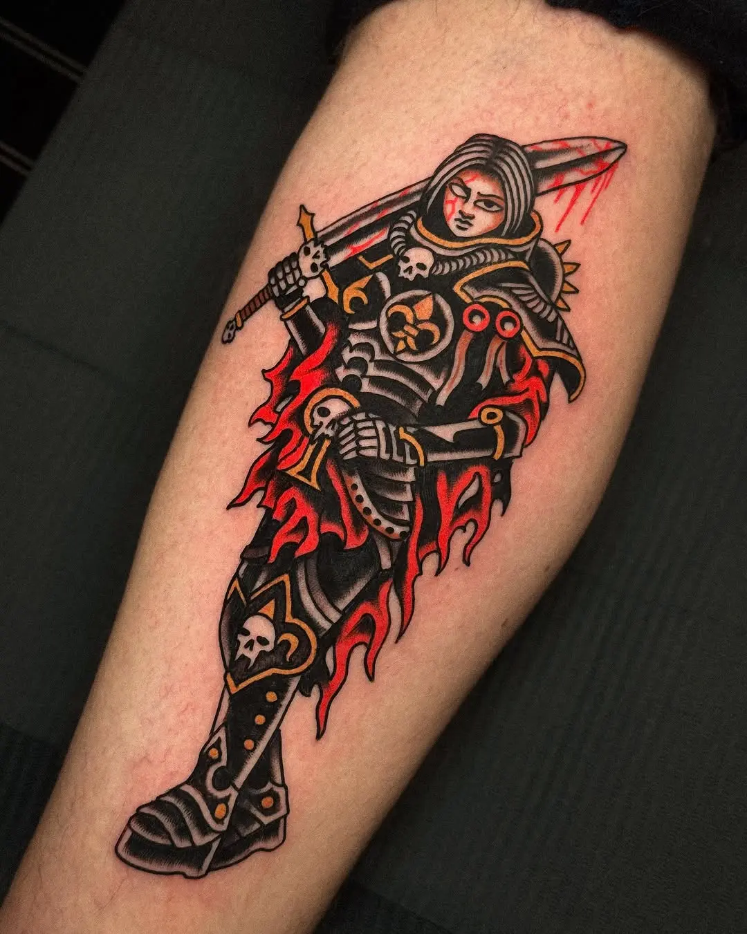 Striking warrior tattoo with vibrant flames
