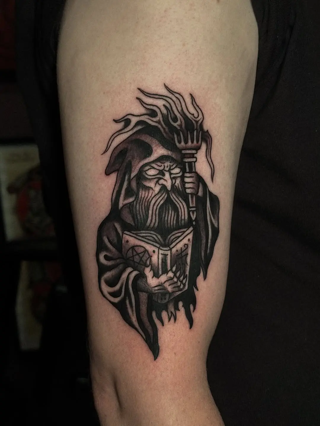 Exquisite Wizard Tattoo Design with Spellbook