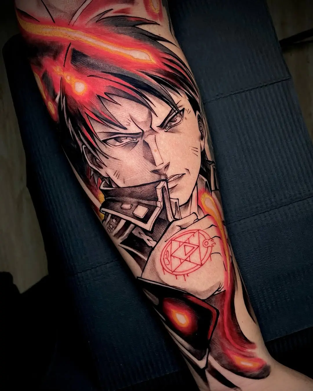 Dynamic anime tattoo full of energy and emotion