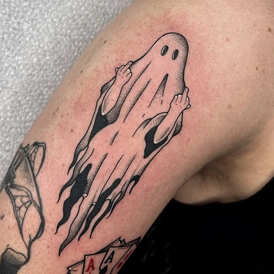 Playful ghost tattoo with attitude