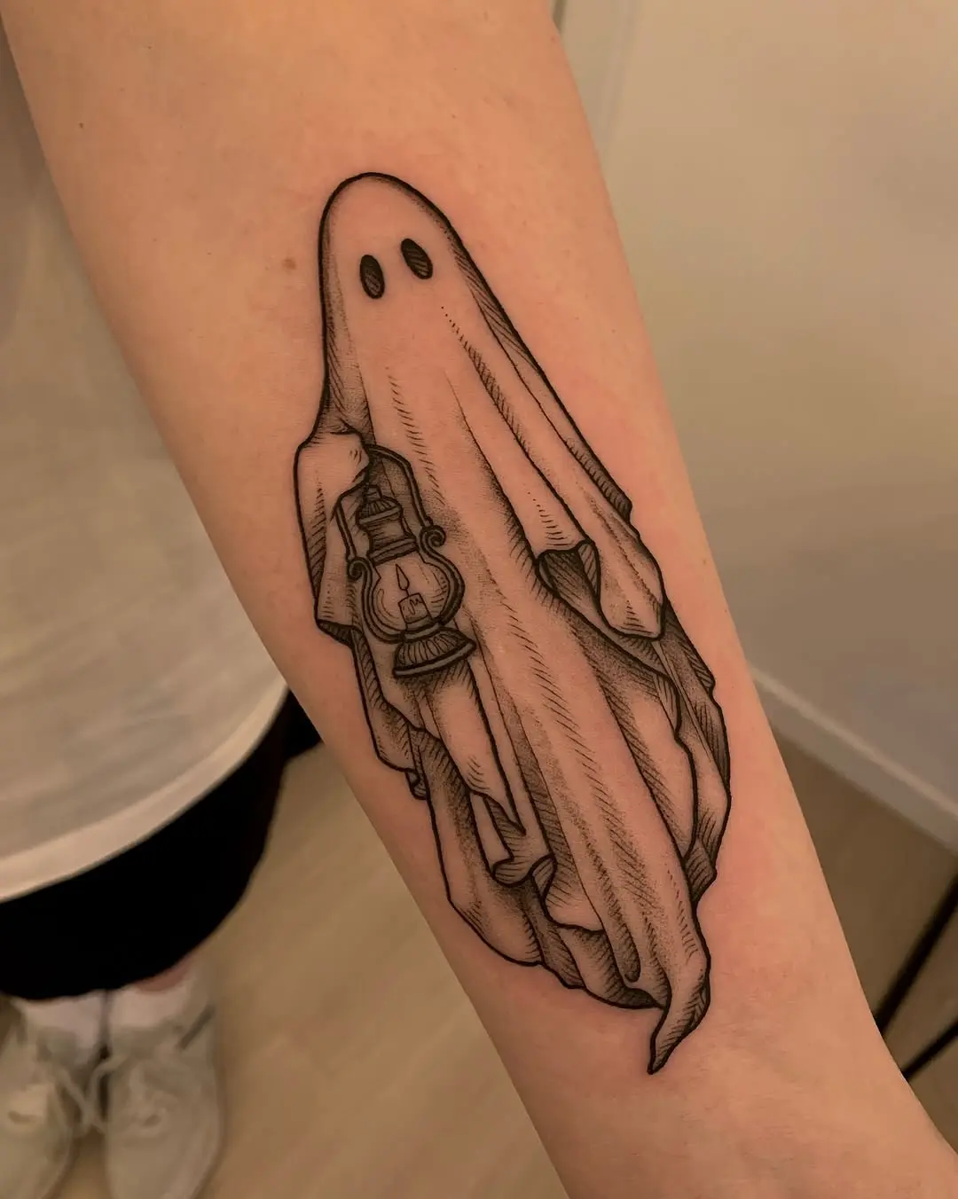 Charming ghost design with lantern art.
