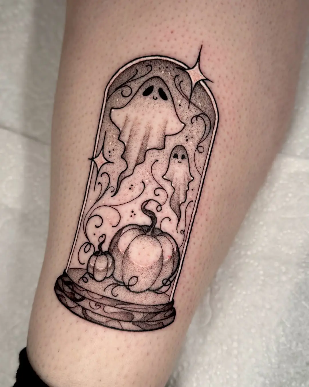 Charming ghosts within a whimsical pumpkin scene