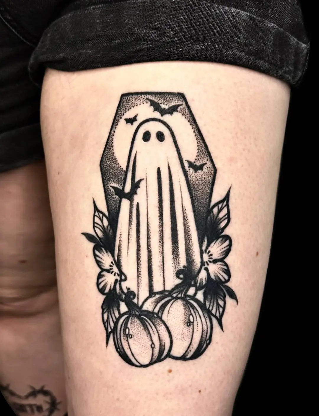 Charming ghost tattoo with pumpkins and flowers