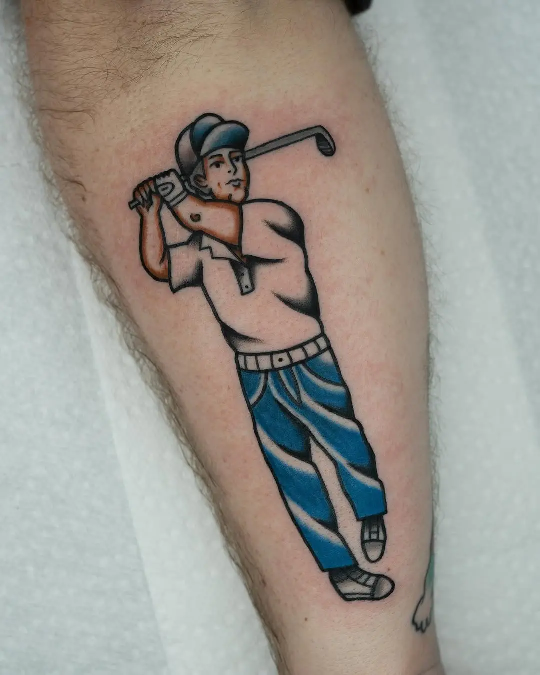 Unique golfer tattoo showcasing classic style