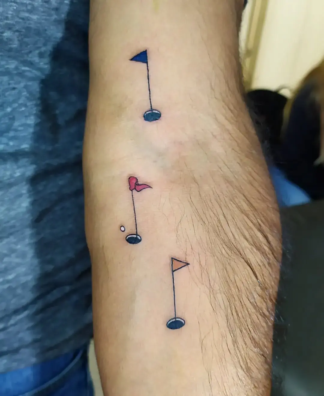 Creative golf-themed musical note tattoos